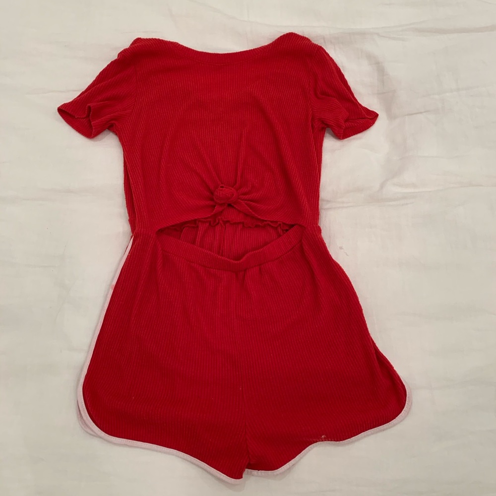 Read one piece romper with cut in the middle